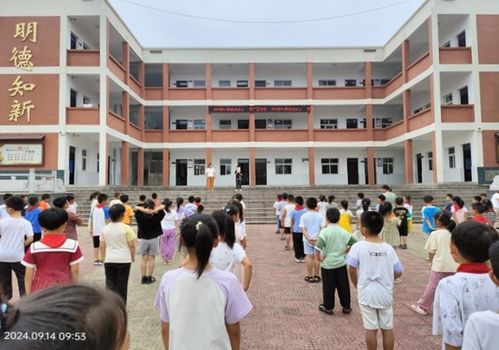 潜山市岭头中心小学开展推普周宣传活动